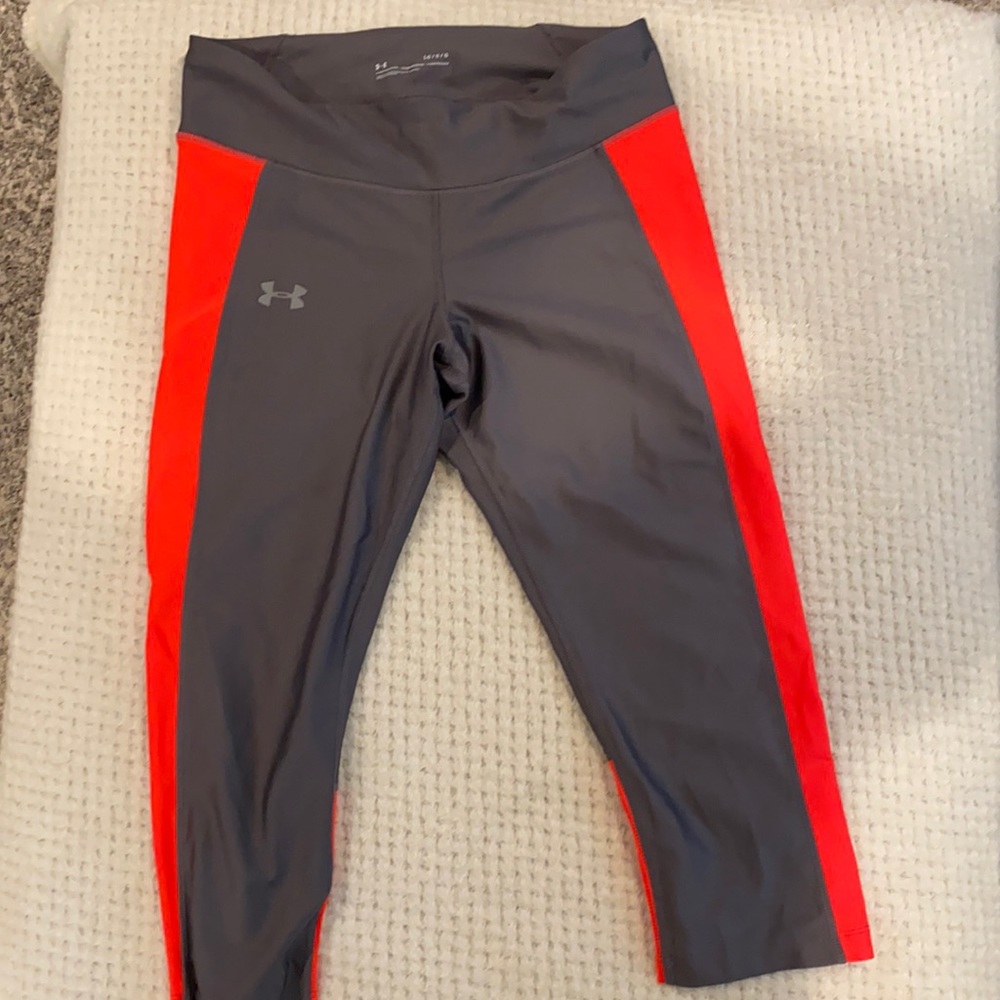 Under Armour silver and orange compression capris